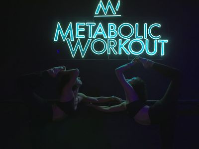 Abstract yoga studio lighting with neon lime accents